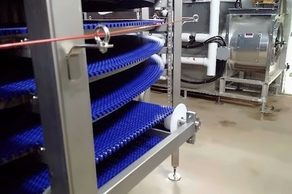 Compact spiral freezer installed in existing production line
